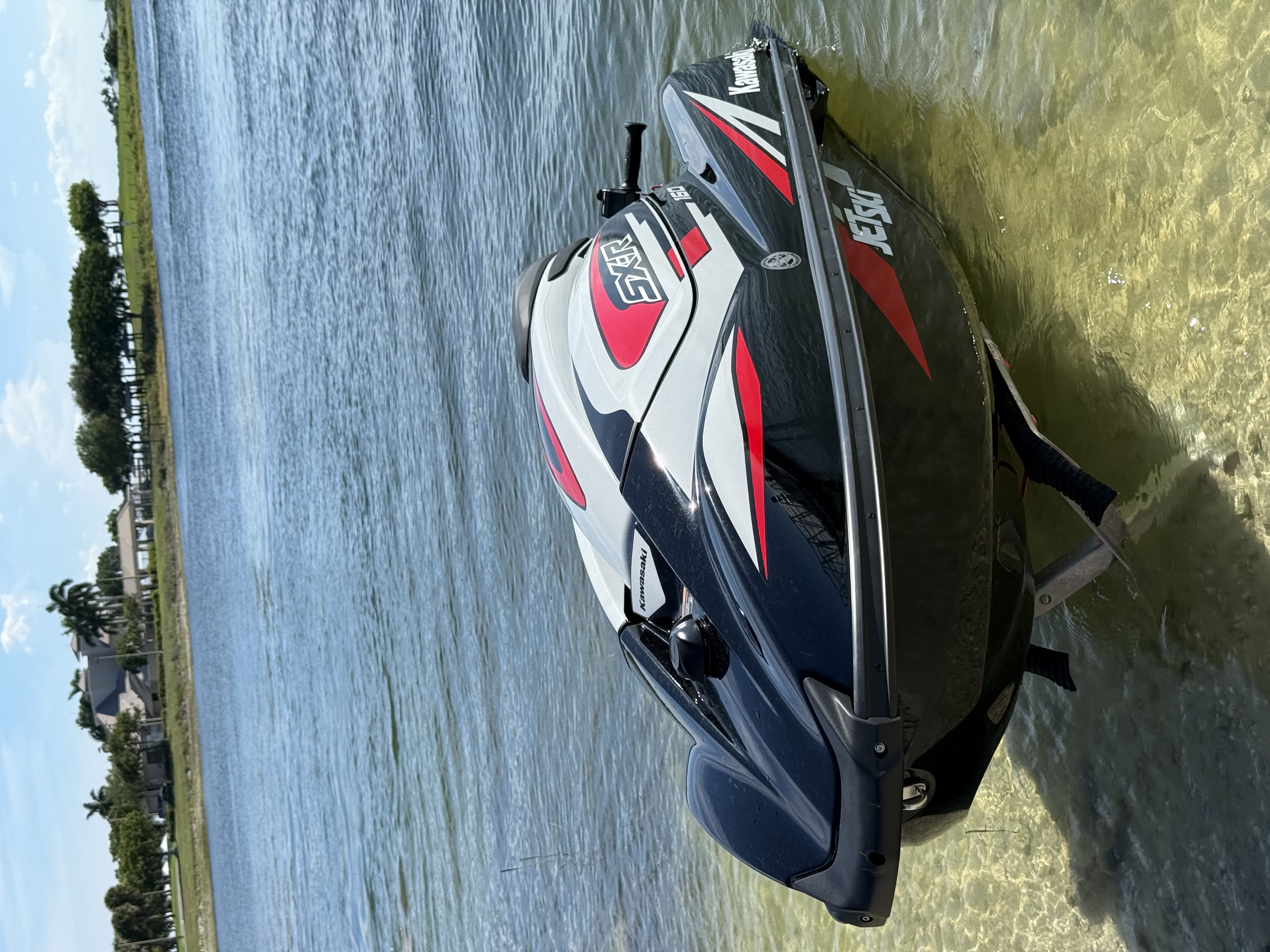 Kawasaki SX-R jet ski in shallow water